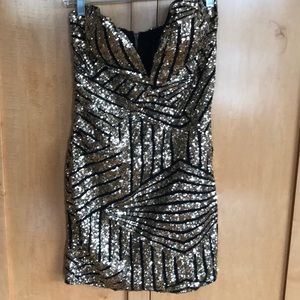 Gold and black sequin dress